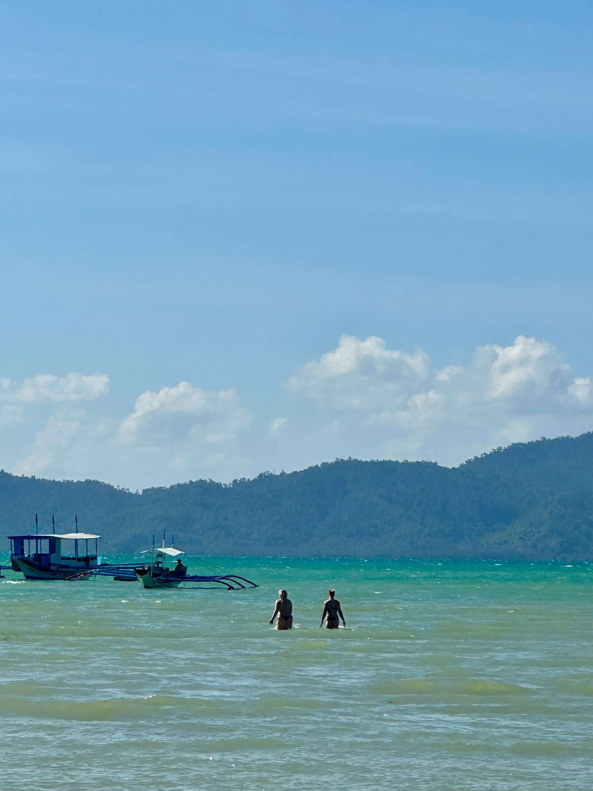 Friends in the ocean in the Philippines